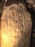 Engraved stones in Pièrre Plate covered alley